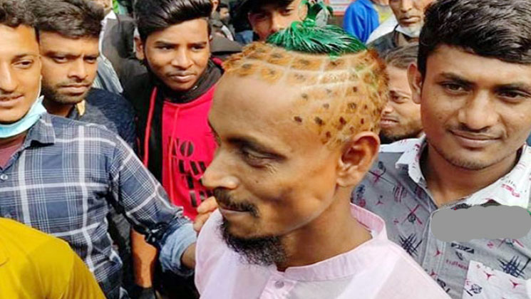 আনারসের আদলে মাথা সাজিয়ে নির্বাচনী প্রচারণা