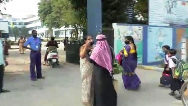 ফের স্কুলে ঢোকার মুখে ছাত্রীদের খুলতে হল হিজাব
